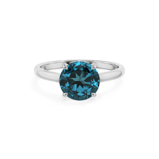 natural london-blue-topaz round solitaire rings in platinum 