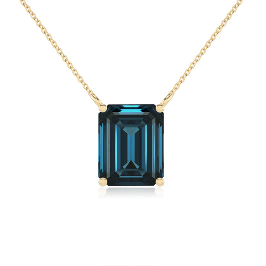 natural london-blue-topaz emerald cut solitaire necklaces in yellow gold 