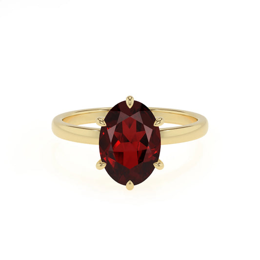 natural garnet oval solitaire rings in yellow gold 