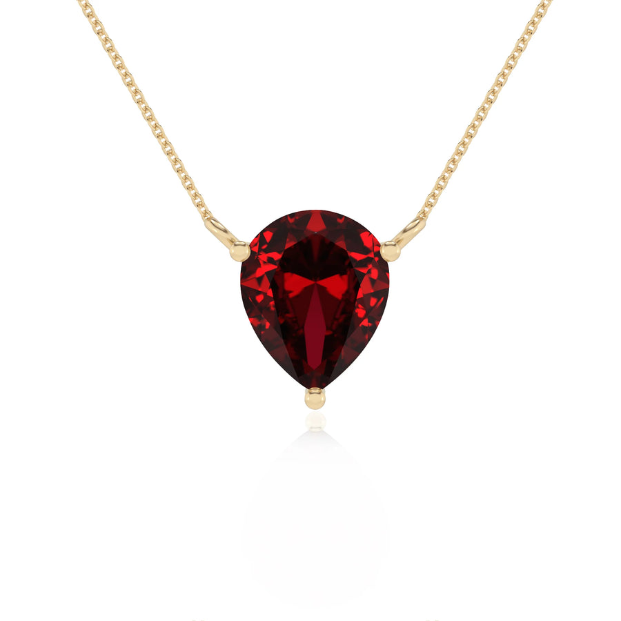 lab grown ruby pear solitaire necklaces in yellow gold 