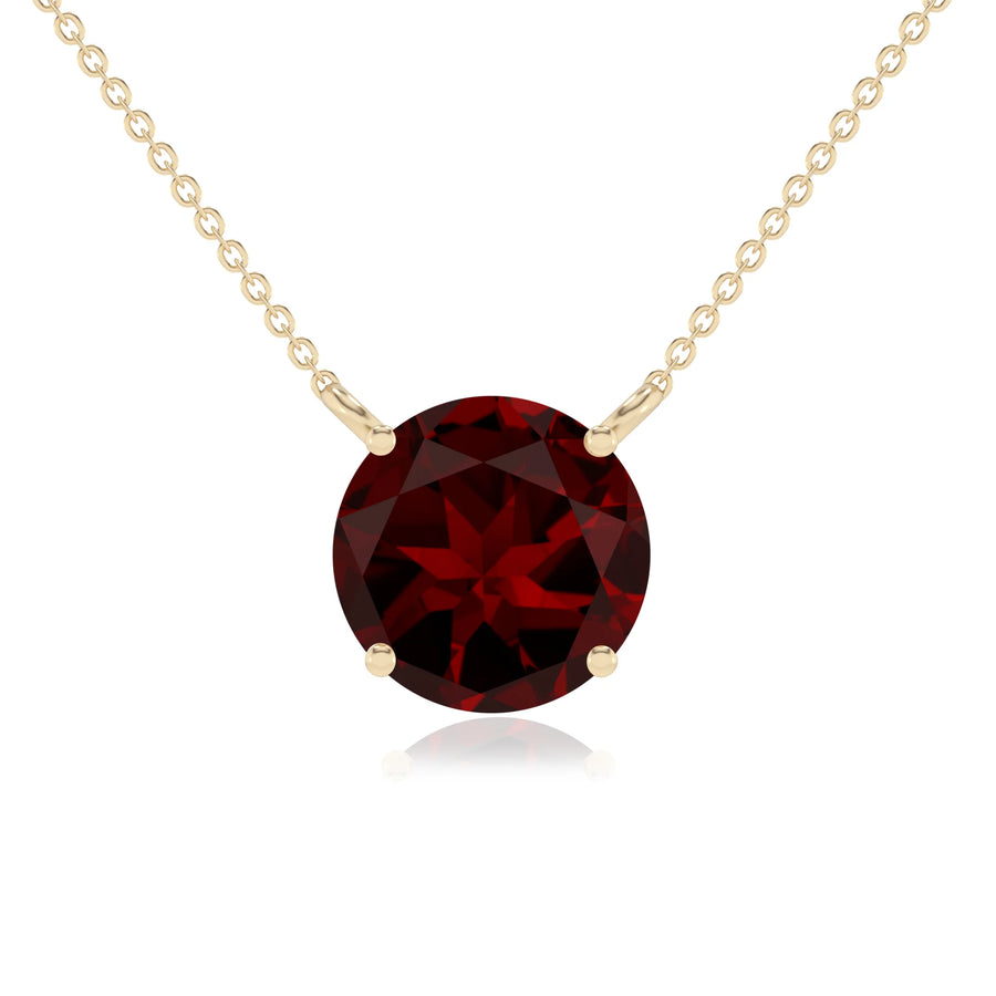 natural garnet round solitaire necklaces in yellow gold 