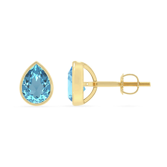 natural swiss blue topaz pear stud earrings in yellow gold 