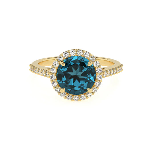 natural london-blue-topaz round solitaire rings in yellow gold 