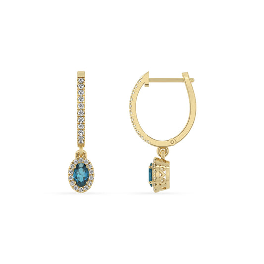 natural london blue topaz oval drop earrings in yellow gold 