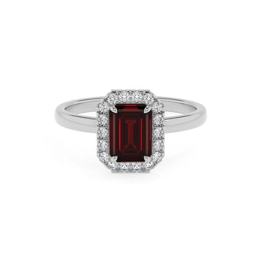 natural garnet emerald cut solitaire rings in platinum 