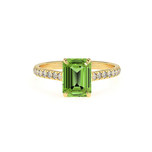 natural peridot emerald cut half eternity solitaire engagement rings in yellow gold 