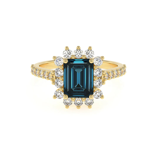 natural london-blue-topaz emerald cut solitaire rings in yellow gold 
