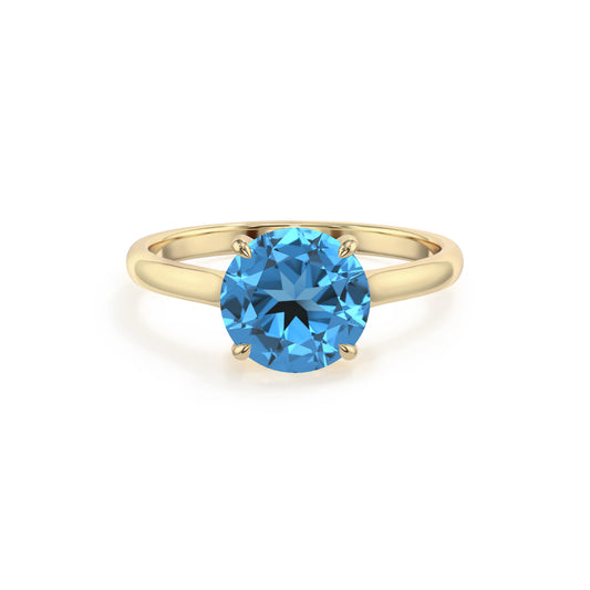 natural swiss-blue-topaz round solitaire rings in yellow gold 