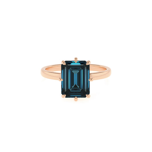 natural london-blue-topaz emerald cut solitaire rings in rose gold 