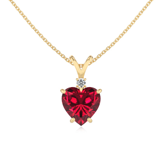 lab grown ruby heart solitaire v-bale necklaces in yellow gold 