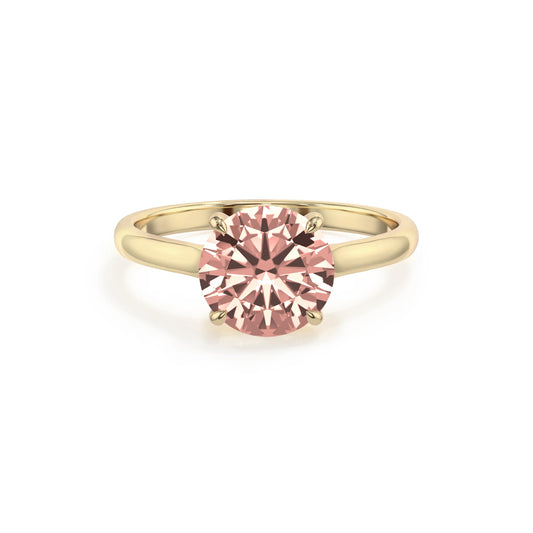 lab grown morganite round solitaire rings in yellow gold 