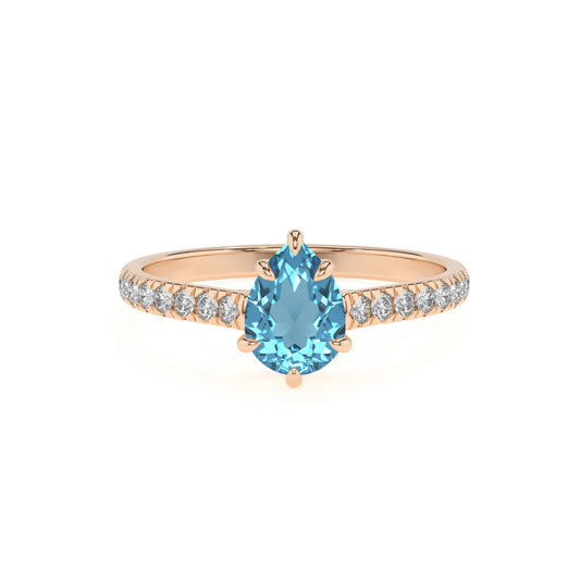 natural swiss-blue-topaz pear half eternity solitaire engagement rings in rose gold 