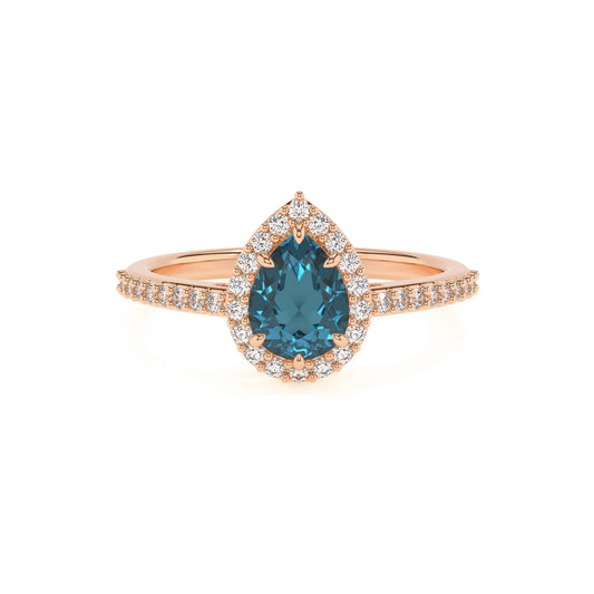 natural london-blue-topaz pear solitaire rings in rose gold 
