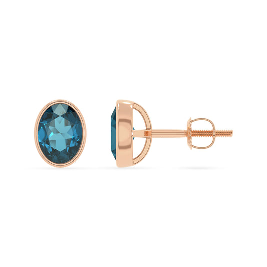 natural london blue topaz oval stud earrings in rose gold 