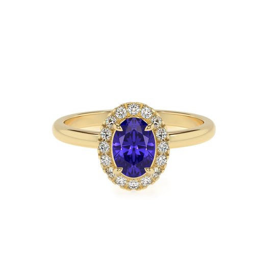 lab grown tanzanite oval solitaire rings in yellow gold 