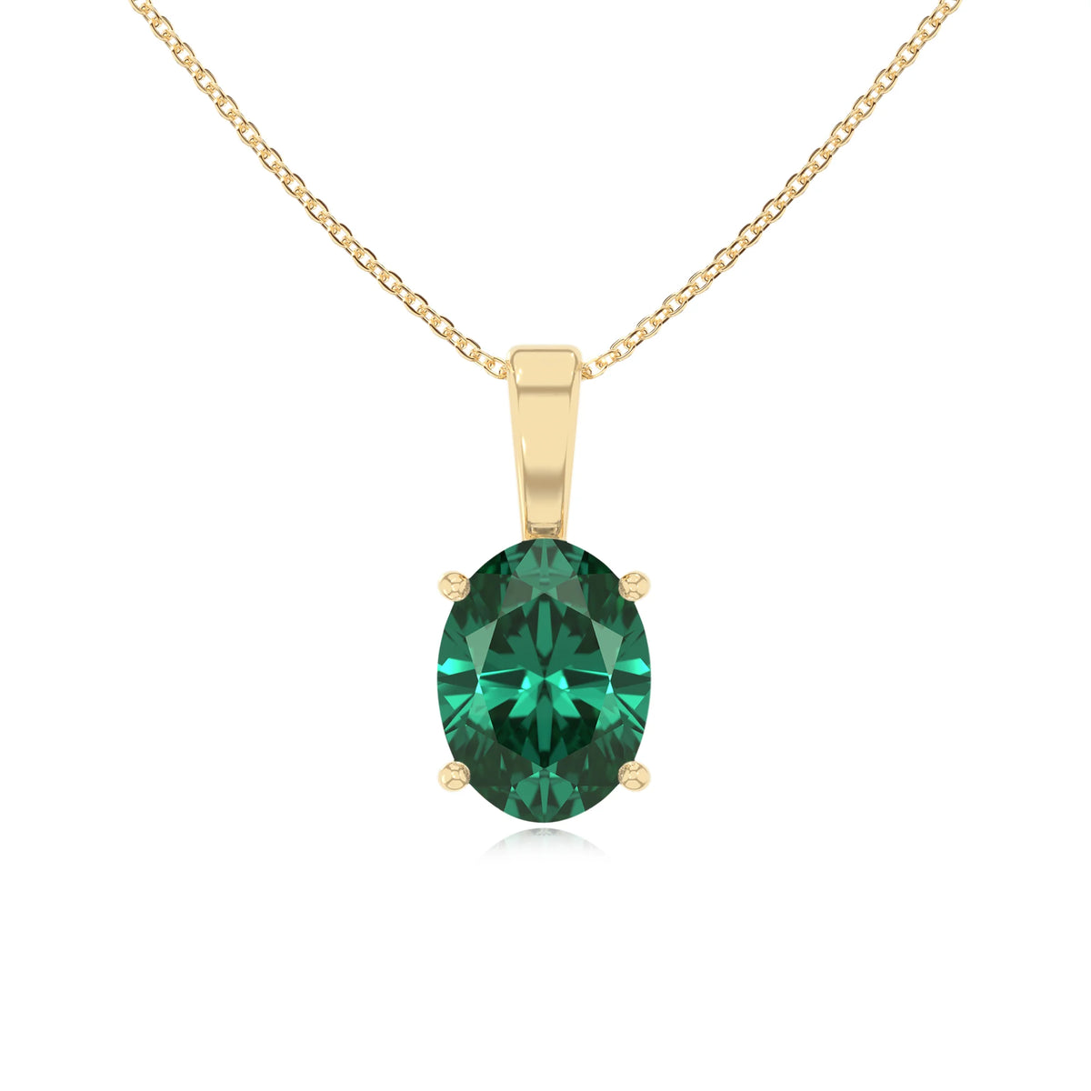 lab grown emerald oval solitaire necklaces in yellow gold 