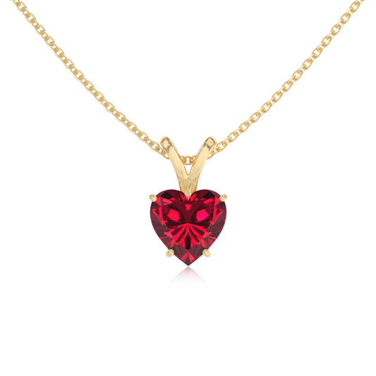 lab grown ruby heart solitaire v-bale necklaces in yellow gold 