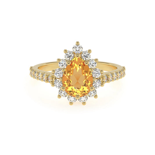 lab grown citrine pear solitaire rings in yellow gold 