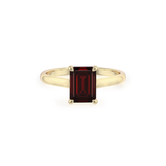 natural garnet emerald cut solitaire rings in yellow gold 