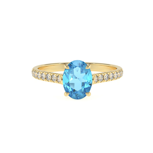 natural swiss-blue-topaz oval half eternity solitaire engagement rings in yellow gold 