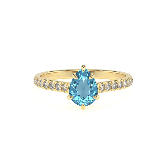 natural swiss-blue-topaz pear half eternity solitaire engagement rings in yellow gold 