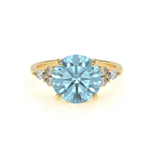 lab grown aquamarine round solitaire rings in yellow gold 
