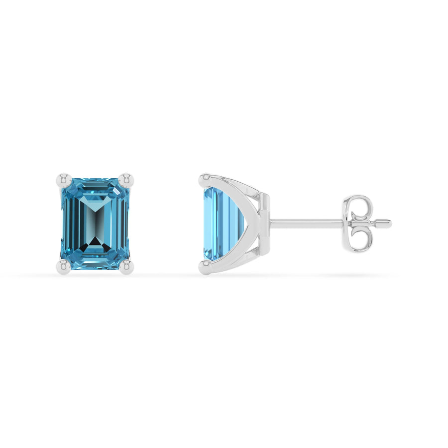 natural swiss blue topaz emerald cut stud earrings in platinum 