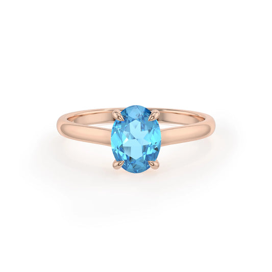 natural swiss-blue-topaz oval solitaire rings in rose gold 