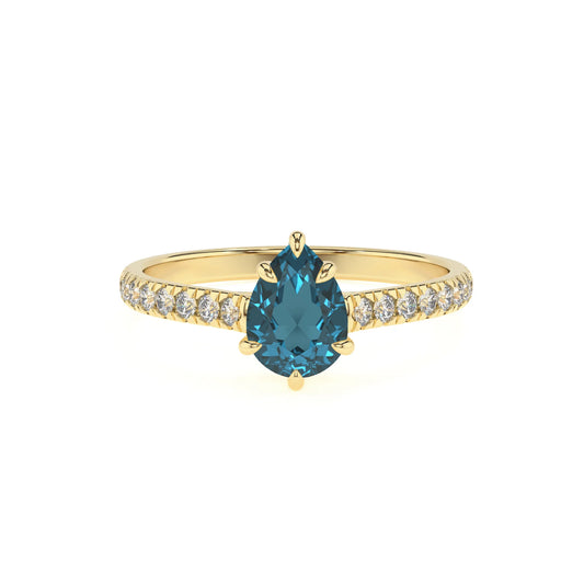 natural london-blue-topaz pear half eternity solitaire engagement rings in yellow gold 