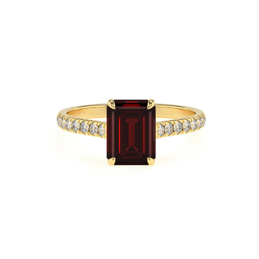 natural garnet emerald cut half eternity solitaire engagement rings in yellow gold 