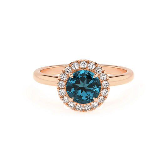 natural london-blue-topaz round solitaire rings in rose gold 