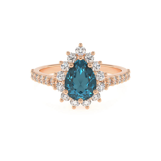 natural london-blue-topaz pear solitaire rings in rose gold 