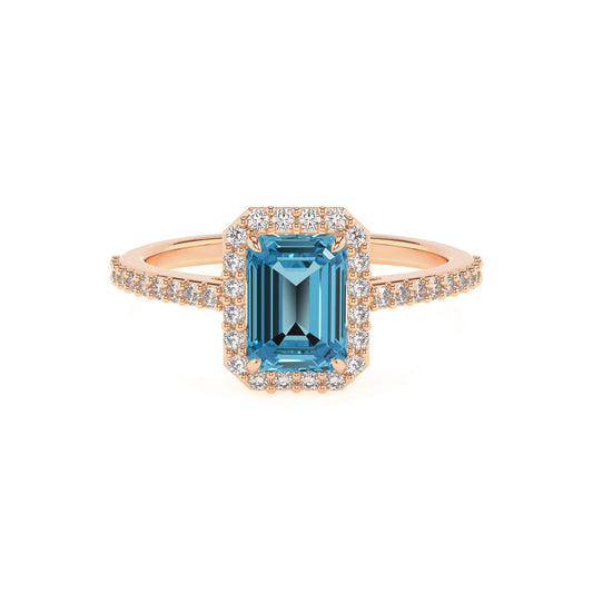 natural swiss-blue-topaz emerald cut solitaire rings in rose gold 