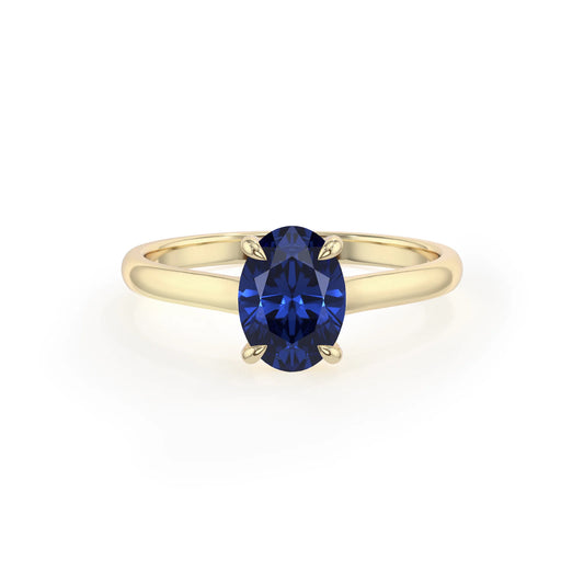 lab grown blue-sapphire oval solitaire rings in yellow gold 