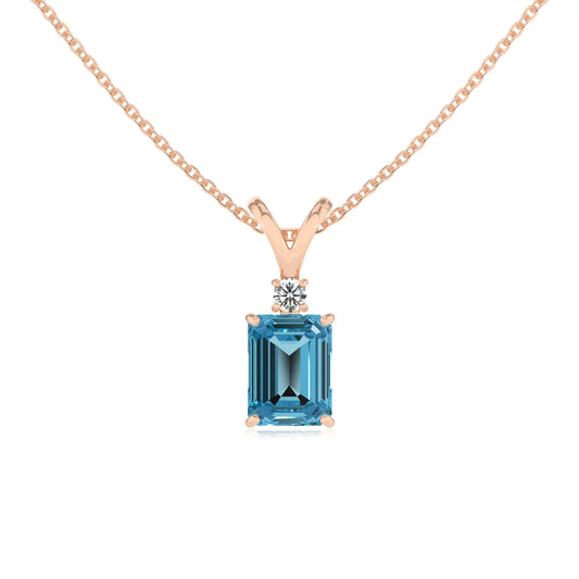 natural swiss-blue-topaz emerald cut solitaire v-bale necklaces in rose gold 