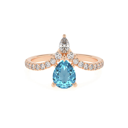 natural swiss-blue-topaz pear solitaire rings in rose gold 