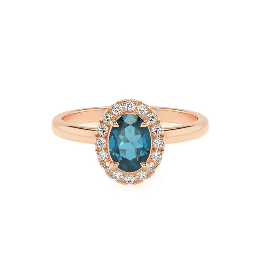 natural london-blue-topaz oval solitaire rings in rose gold 