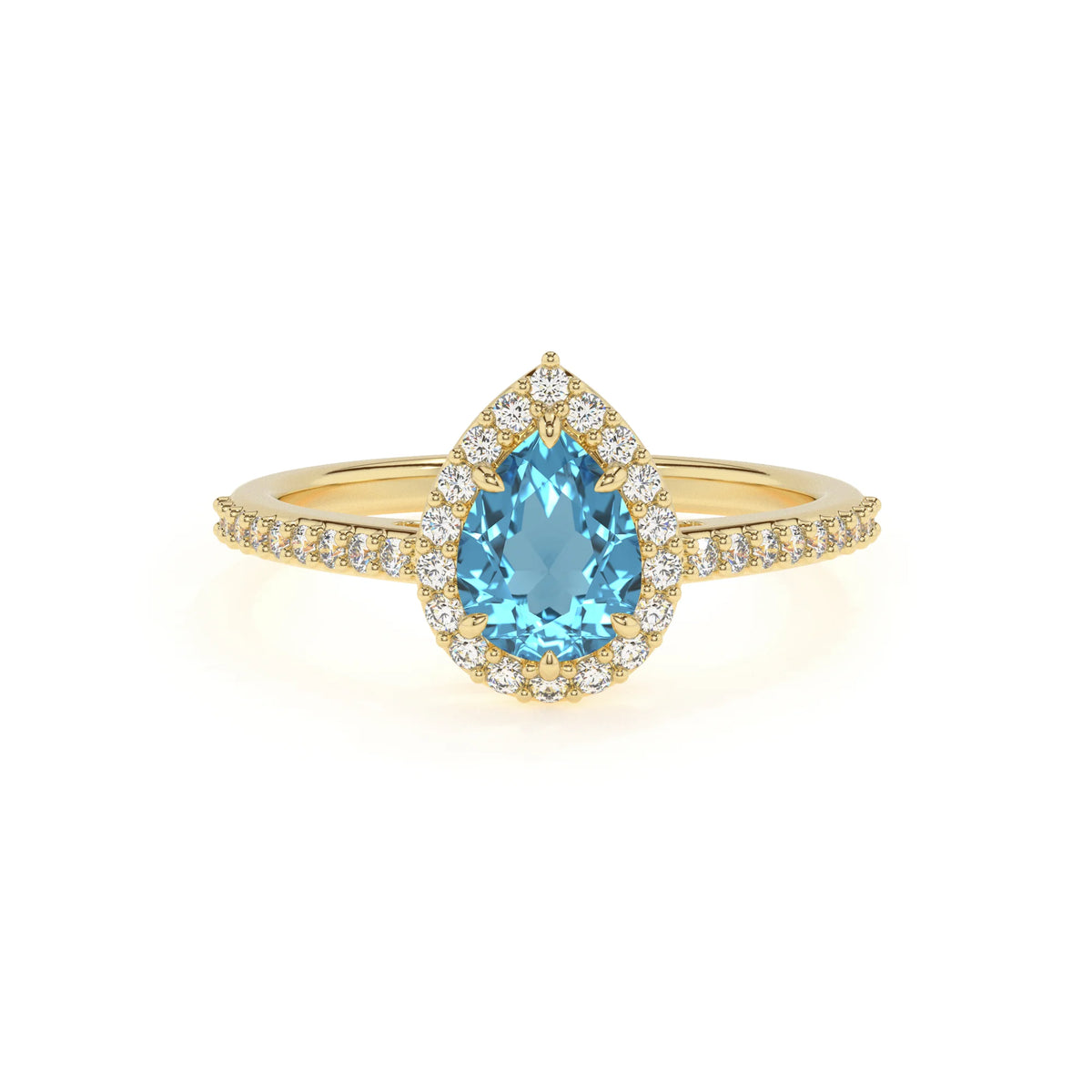 natural swiss-blue-topaz pear solitaire rings in yellow gold 