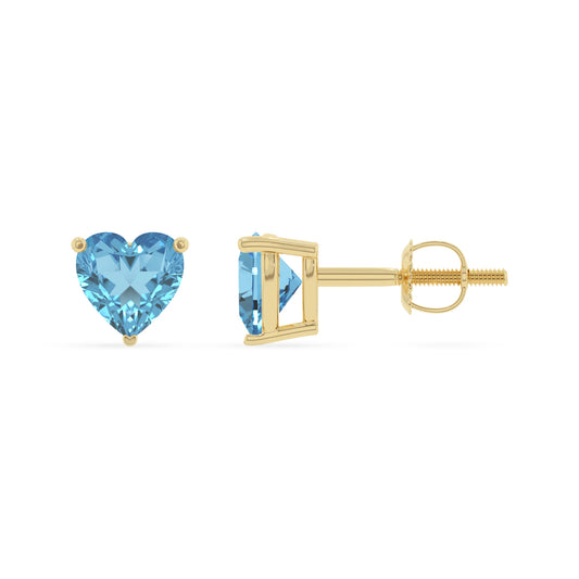 natural swiss blue topaz heart stud earrings in yellow gold 