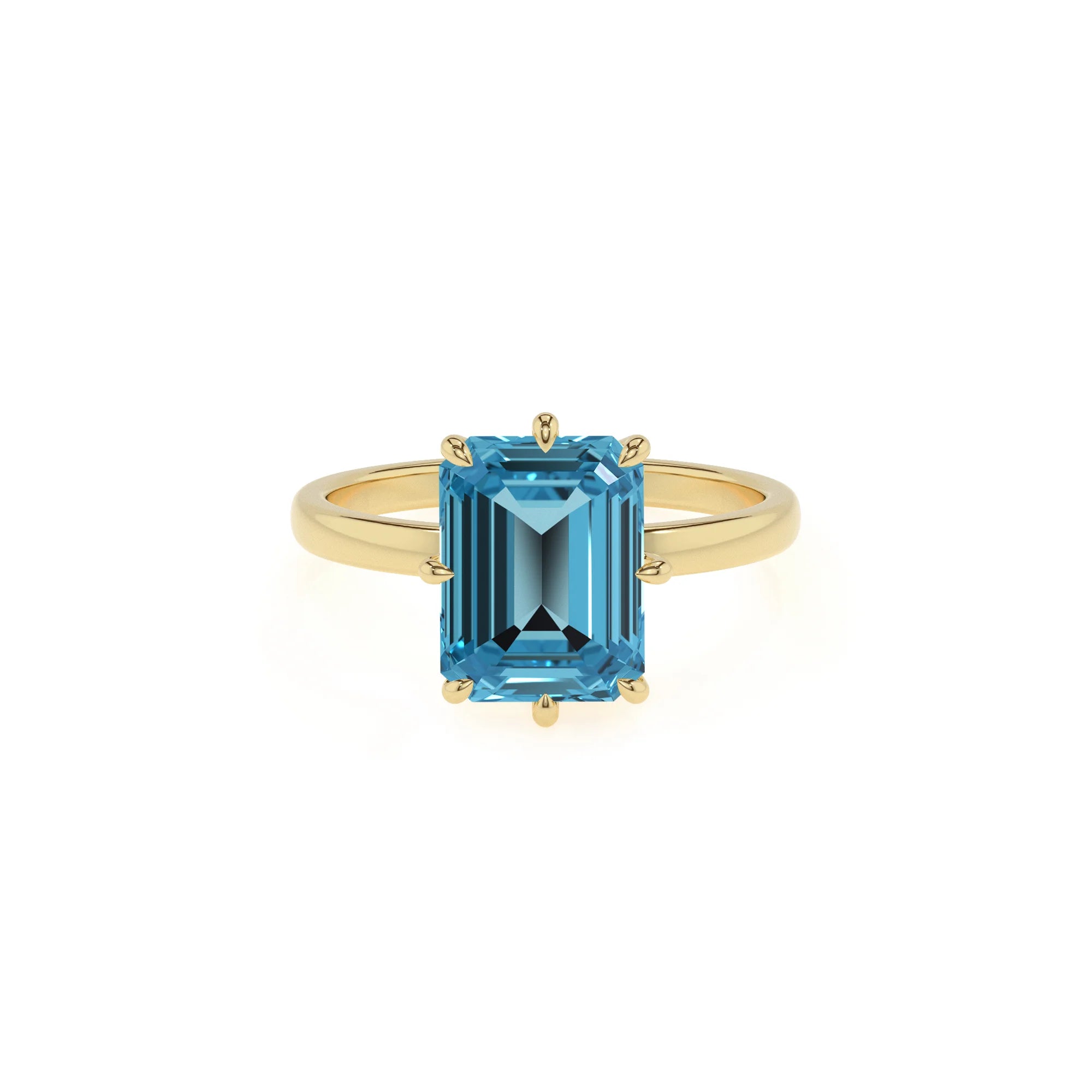 natural swiss-blue-topaz emerald cut solitaire rings in yellow gold 