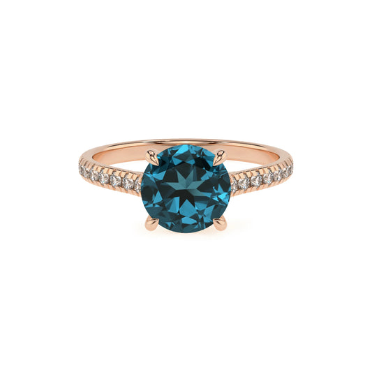 natural london-blue-topaz round half eternity solitaire engagement rings in rose gold 
