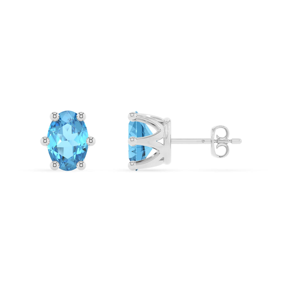 natural swiss blue topaz oval stud earrings in sterling silver 