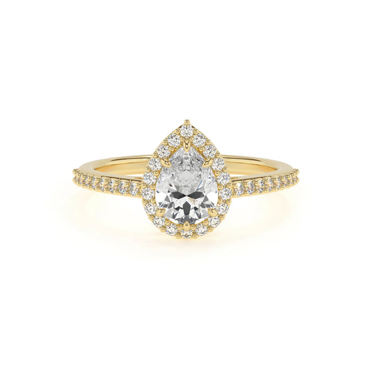 lab grown moissanite pear solitaire rings in yellow gold 