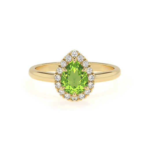 natural peridot pear solitaire rings in yellow gold 