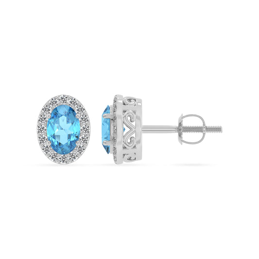 natural swiss blue topaz oval stud earrings in white gold 