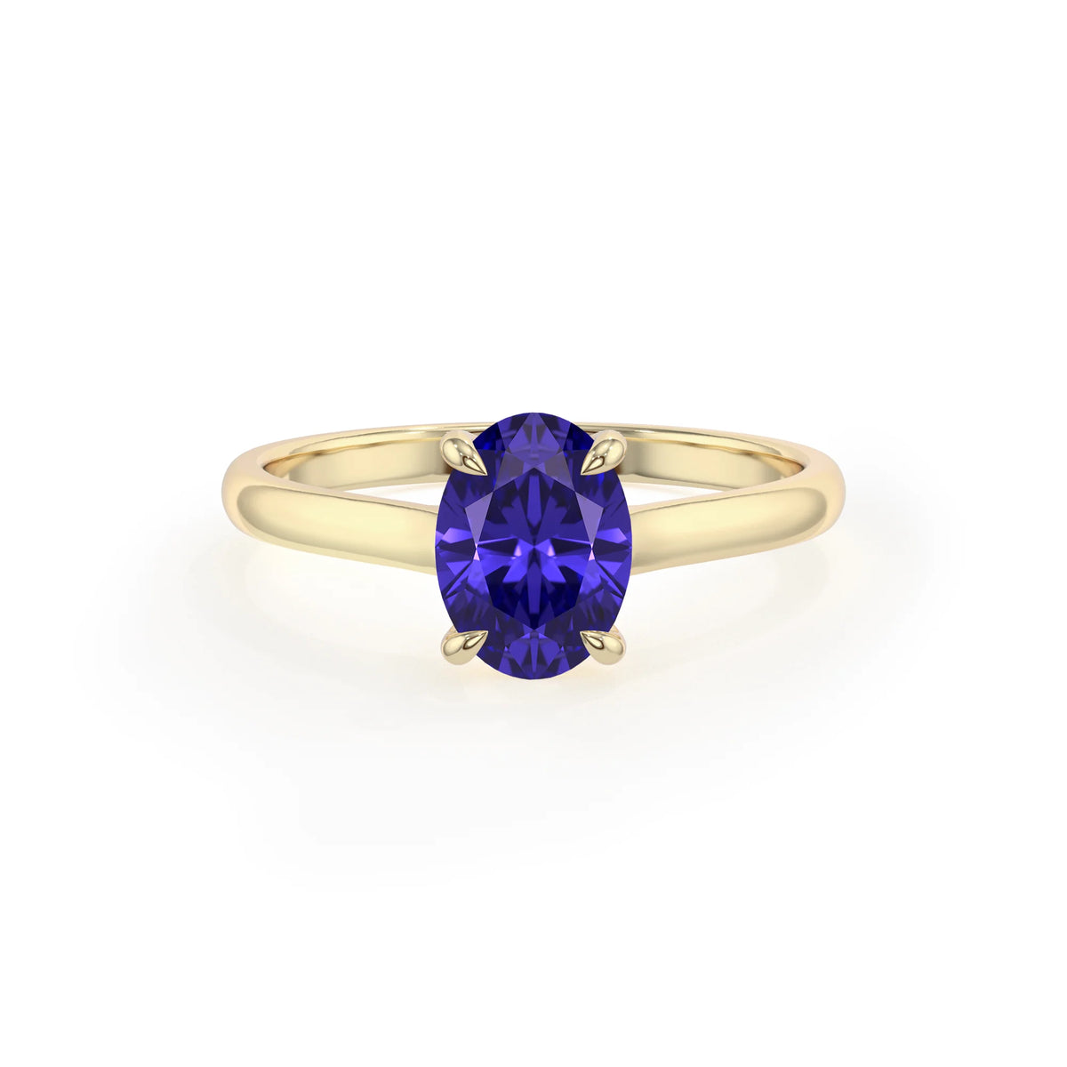 lab grown tanzanite oval solitaire rings in yellow gold 