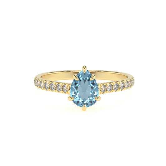 lab grown aquamarine pear half eternity solitaire engagement rings in yellow gold 
