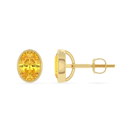 lab grown yellow sapphire oval stud earrings in yellow gold 