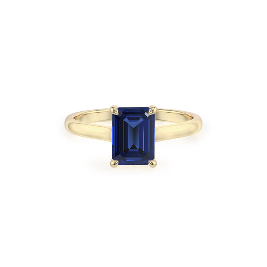 lab grown blue-sapphire emerald cut solitaire rings in yellow gold 