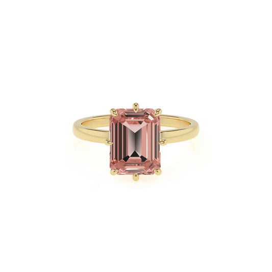 lab grown morganite emerald cut solitaire rings in yellow gold 